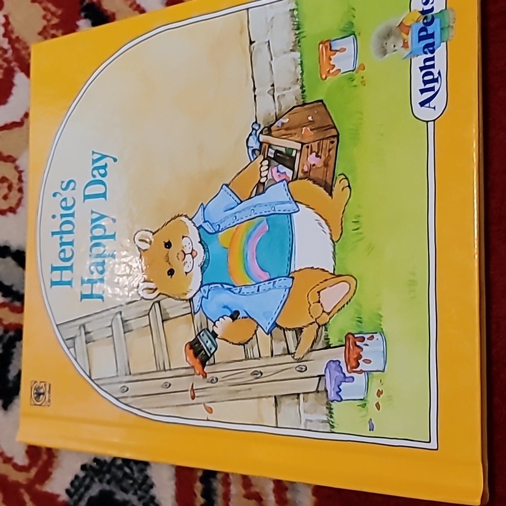 Herbie's Happy Day Hardcover Book from AlphaPets Series